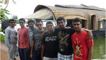 John with friends in Kerala.